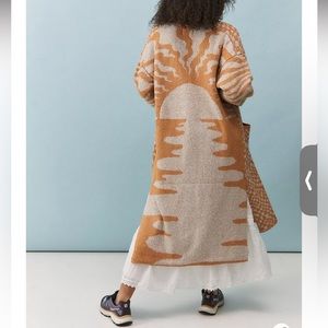 Urban Outfitters long duster cardigan. Golden and beige with sun pattern. Size S